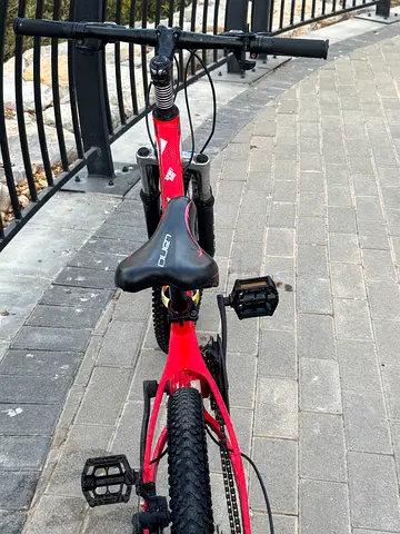 Red Mountain Bike with Front Suspension