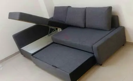 Grey L-shaped Sofa Bed with Storage — Good Condition
