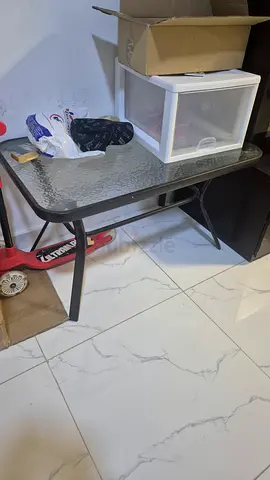 Glass top side table with metal frame - used