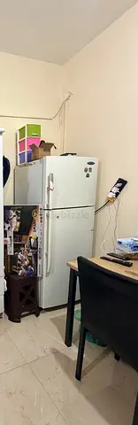 Used White Double-Door Refrigerator - Good Working Condition