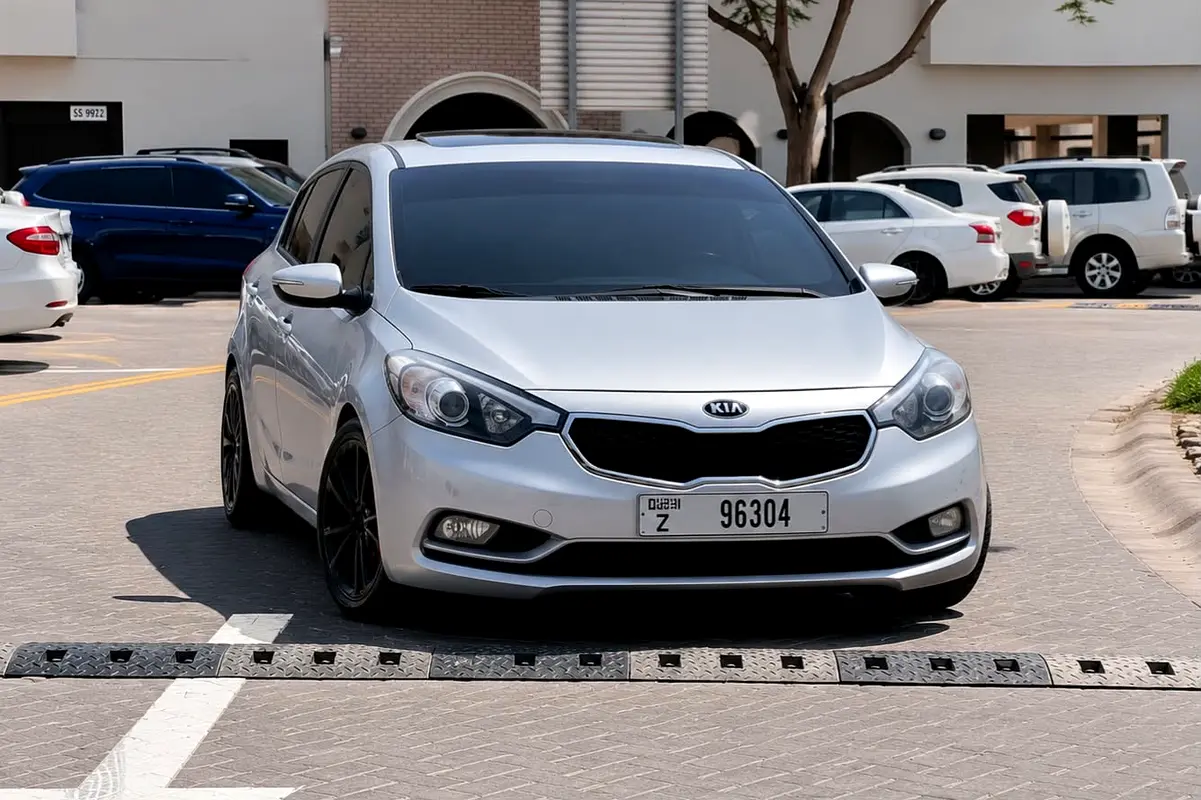 Kia Cerato 2015 — photo 1 of 10
