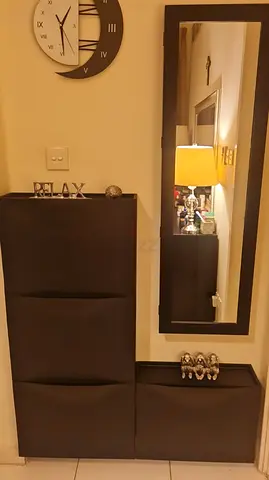 Compact black hallway shoe cabinet — good condition
