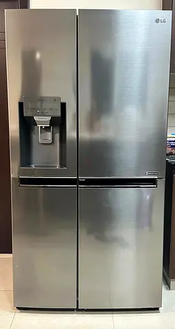 LG Stainless Steel Side-by-Side Refrigerator with Water Dispenser - Good Condition