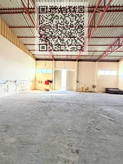 Warehouse for annual rent in Umm Al Thuoob, area 2,500 square feet.