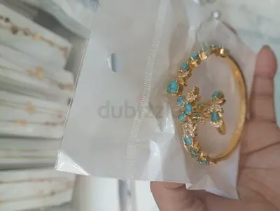 Gold-tone Bracelet and Matching Earrings Set with Turquoise Stones