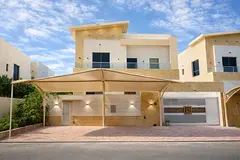 Villa for sale at a bargain price in Al Yasmin area, modern finishing, split air conditioning, prime