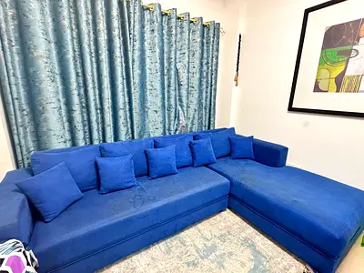 Comfortable Blue L-Shaped Sectional Sofa with Cushions