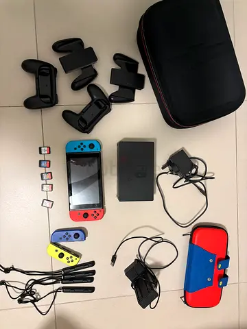 Nintendo Switch V2 - Fully Equipped Setup with 4 Joy-Cons + 5 Games - Complete Bundle