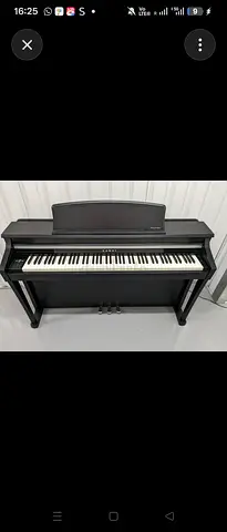 Used digital upright piano with bench and three pedals - great working condition