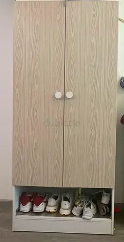 IKEA-style tall shoe cabinet with storage - light wood finish