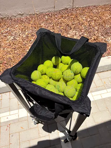 Foldable tennis ball hopper/basket with practice balls (approx. 60+) - good condition