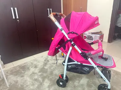 Lightweight Pink Baby Stroller - Good Condition