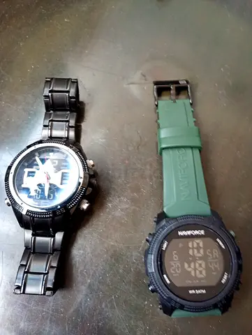 Two mens watches - black metal analog chrono and green Naviforce digital sports watch