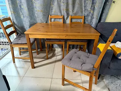 Ikea dining table with 4 chairs and cushions