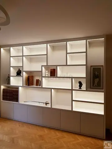 Large Built-in White Display Shelving Unit with LED Lighting