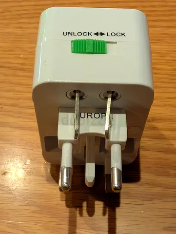 Universal Travel Adapter - Compact UK/EU/US Plug Converter