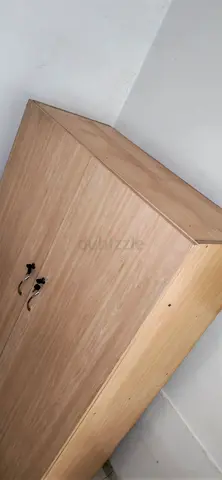 Two-door wooden wardrobe in good condition
