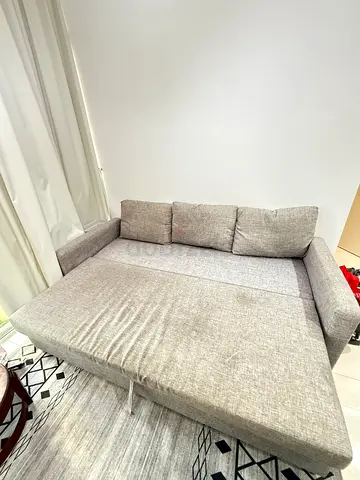 Light Grey 2-Seater Fabric Sofa Bed - Good Condition