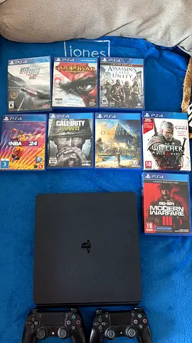 Sony PS4 Slim - 1TB memory with 2 DualShock Controllers and 8 PS4 Games