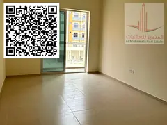 Spacious 2-bedroom apartment with living room and 2 bathrooms available for annual rent in Al Jurf 3