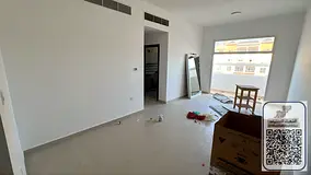 Two master bedrooms and a living room in Al Muwaihat 3, on the main street, open view, high floor, c