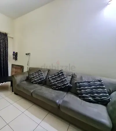 3-seater gray fabric sofa in good condition with cushions