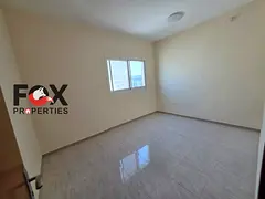 Annual rent opportunity in Al Jurf 3, 2-bedroom apartment with 2 bathrooms and balcony, spacious lay