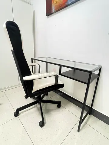 Black metal computer desk with ergonomic office chair - good condition