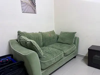 Green 2-Seater Sofa with Cushions - Good Condition