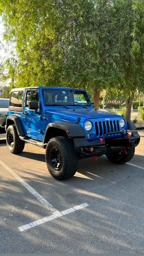 Jeep Wrangler 2014 — photo 1 of 3