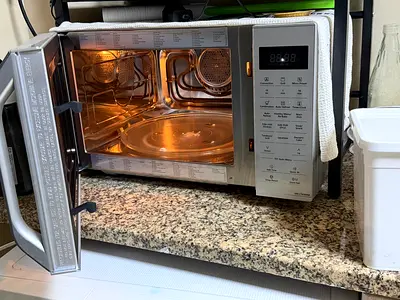 Used stainless steel microwave oven - good working condition