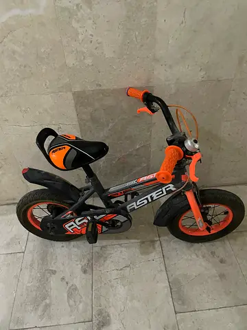 Aster kids bicycle in orange and black