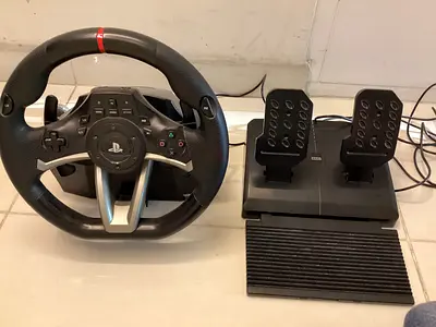 PlayStation compatible racing wheel and pedal set (used)