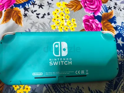 Turquoise Nintendo Switch Lite console - good working condition