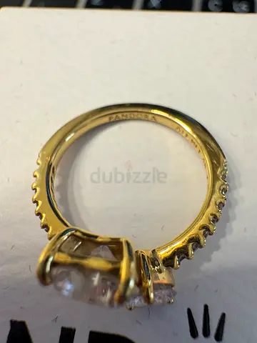 pandora Double Heart Ring
14k gold plating.I am unsure of the size but i can provide pictures.