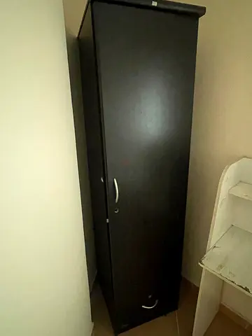 Single-door black wardrobe / armoire in good condition