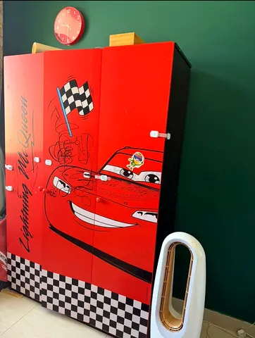 Kids bedroom set - colorful rug and Cars-themed wardrobe included