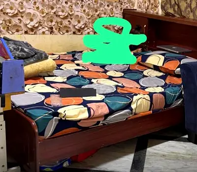Single wooden bed with built-in headboard storage - good condition
