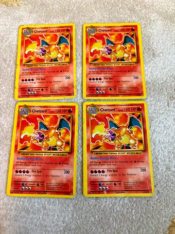 4 Vintage Charizard Pokémon Cards (Same Artwork)