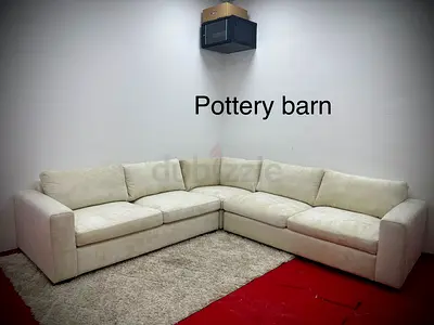 As like new condition pottery barn beige color sofa