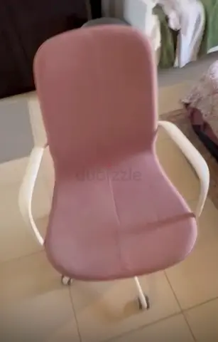 Ikea heavy duty Pink ergonomic swivel office chair with armrests