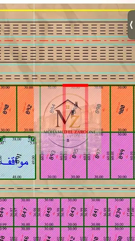A large commercial plot of land in Al Qasimia City, Phase Four, with a remaining installment.