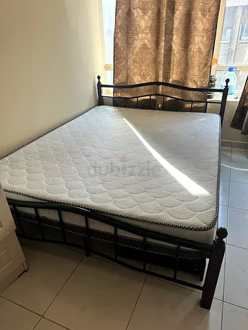 Queen metal bed frame with mattress - good condition