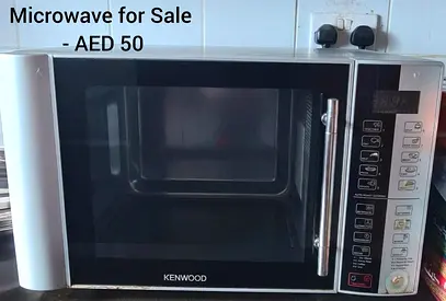 Kenwood Microwave Oven - Good Working Condition, AED 50