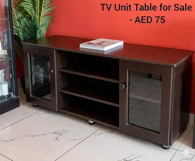 Dark Wood TV Unit Table with Glass Doors - AED 75