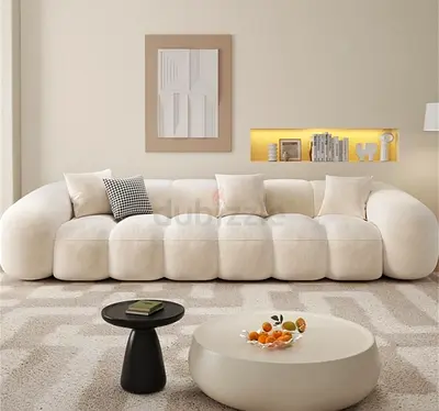 Modern Cream Curved 4-Seater Sofa — Plush Upholstery