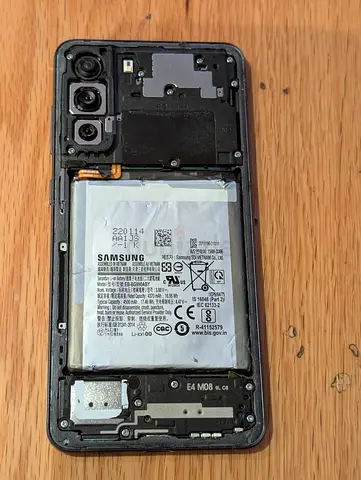 Samsung phone with back cover removed — for parts/repair