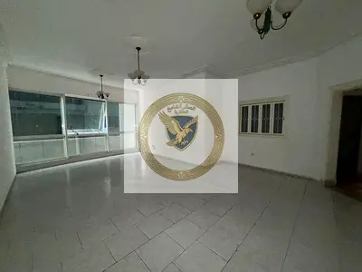 **Annual Apartment for Rent in Al Majaz 3** Free AC, free swimming pool, spacious layout, free maintenance, central AC, and a prime location close to