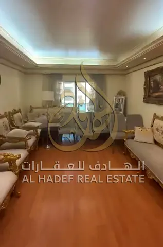a spacious living room, and a maid's room. It is available fully furnished or unfurnished, with preference given to furnished options. The apartment
