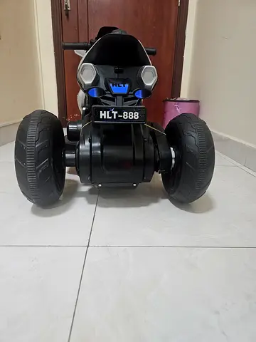 Kids charging moter bike